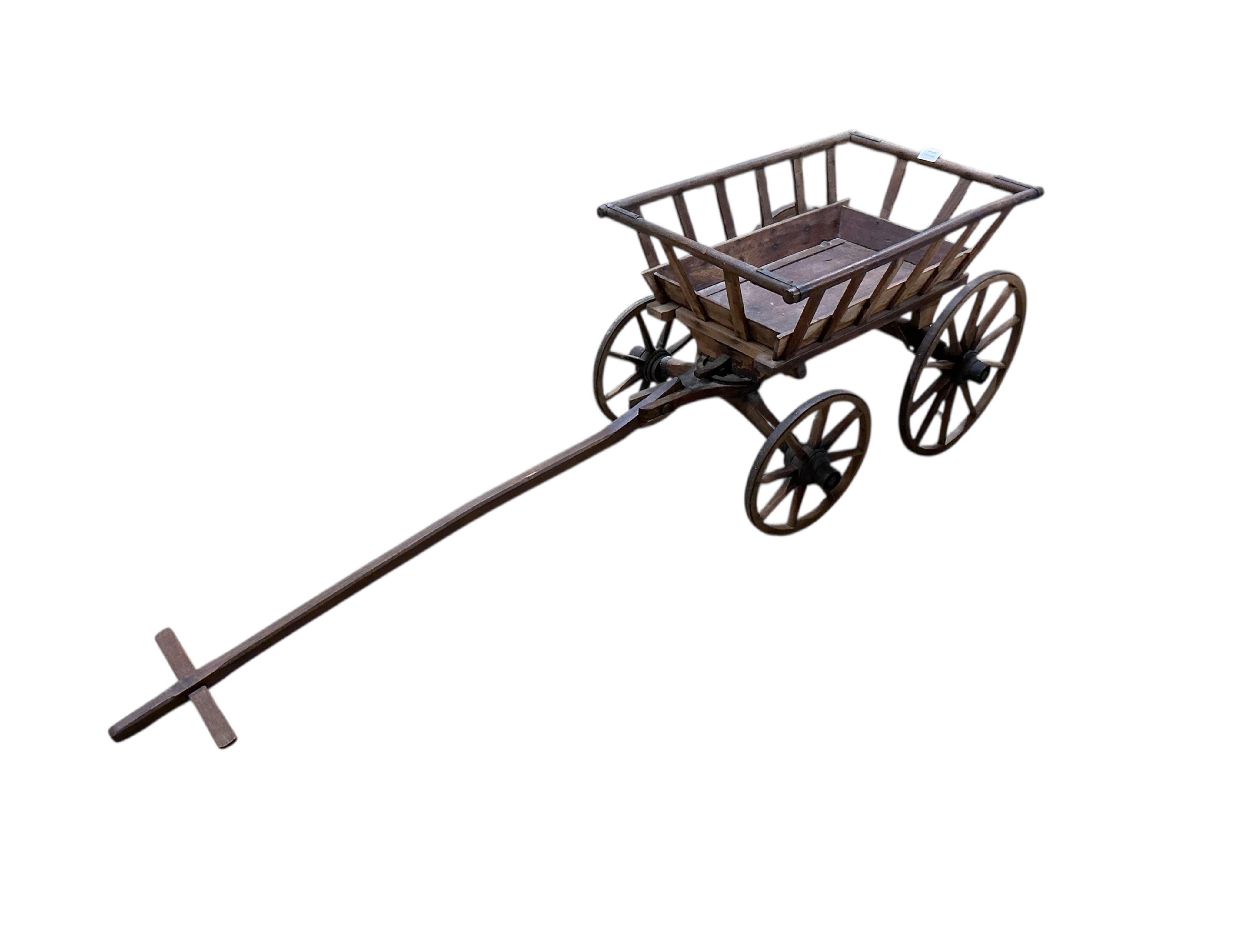 A Victorian iron bound dog cart, length 75cm, width 47cm